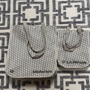 Bundle of large and small Lululemon reusable shopping totes